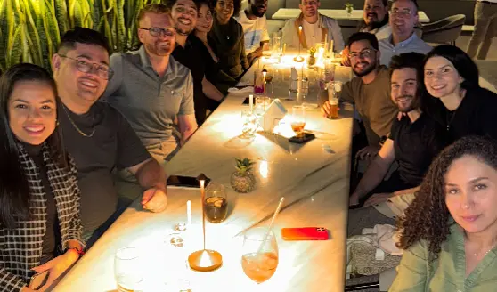 The Bluelight team gathered around a dinner table